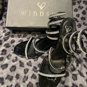 Beautiful rhinestone high heels. Like new. Worn once to a military ball. Size 9.